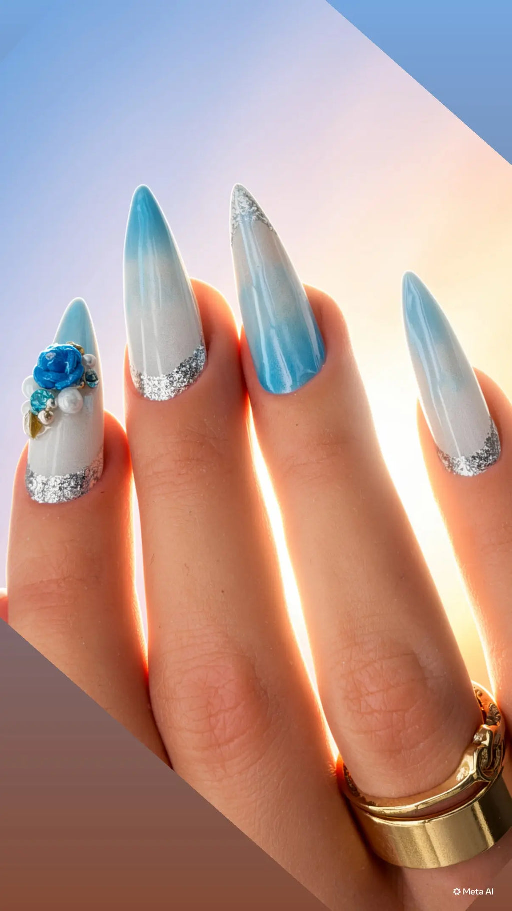 Luxury handmade blue ombré press-on nails with pearlescent shimmer, silver glitter accents, and 3D blue floral embellishments from the Aruba At Sunset Collection.