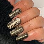 Gilded Instinct handmade leopard press-on nails with champagne bronze cat-eye gel and smoky brown animal print