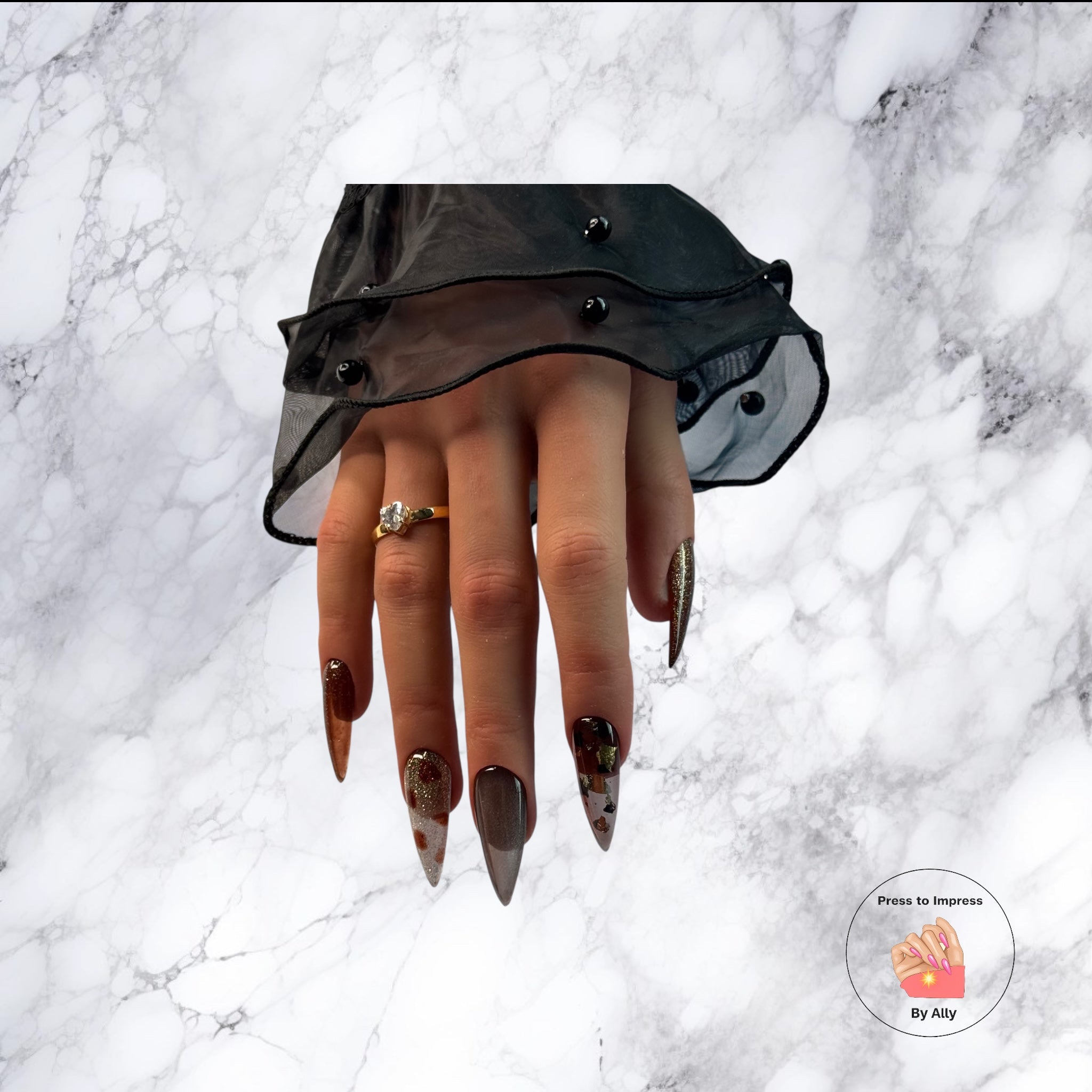 Luxury autumn press-on nails in rich seasonal tones