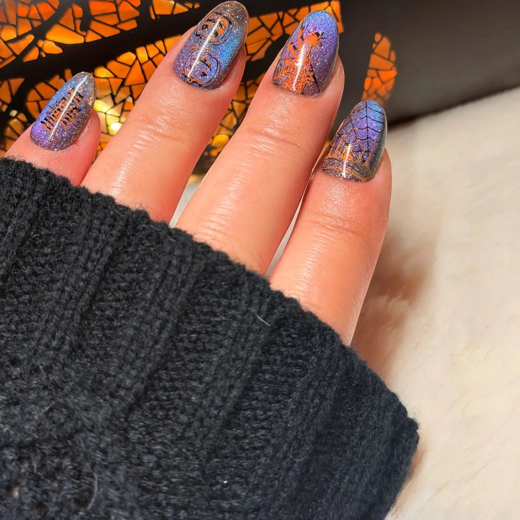 Unearthed handmade halloween press-on nails with smoky shimmer,orange markings and dimensional details