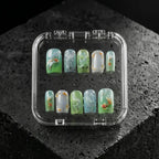Verdant Elixir green floral press-on nails, glossy jade and aqua marble design with gold accents, luxury handmade nail set in clear case