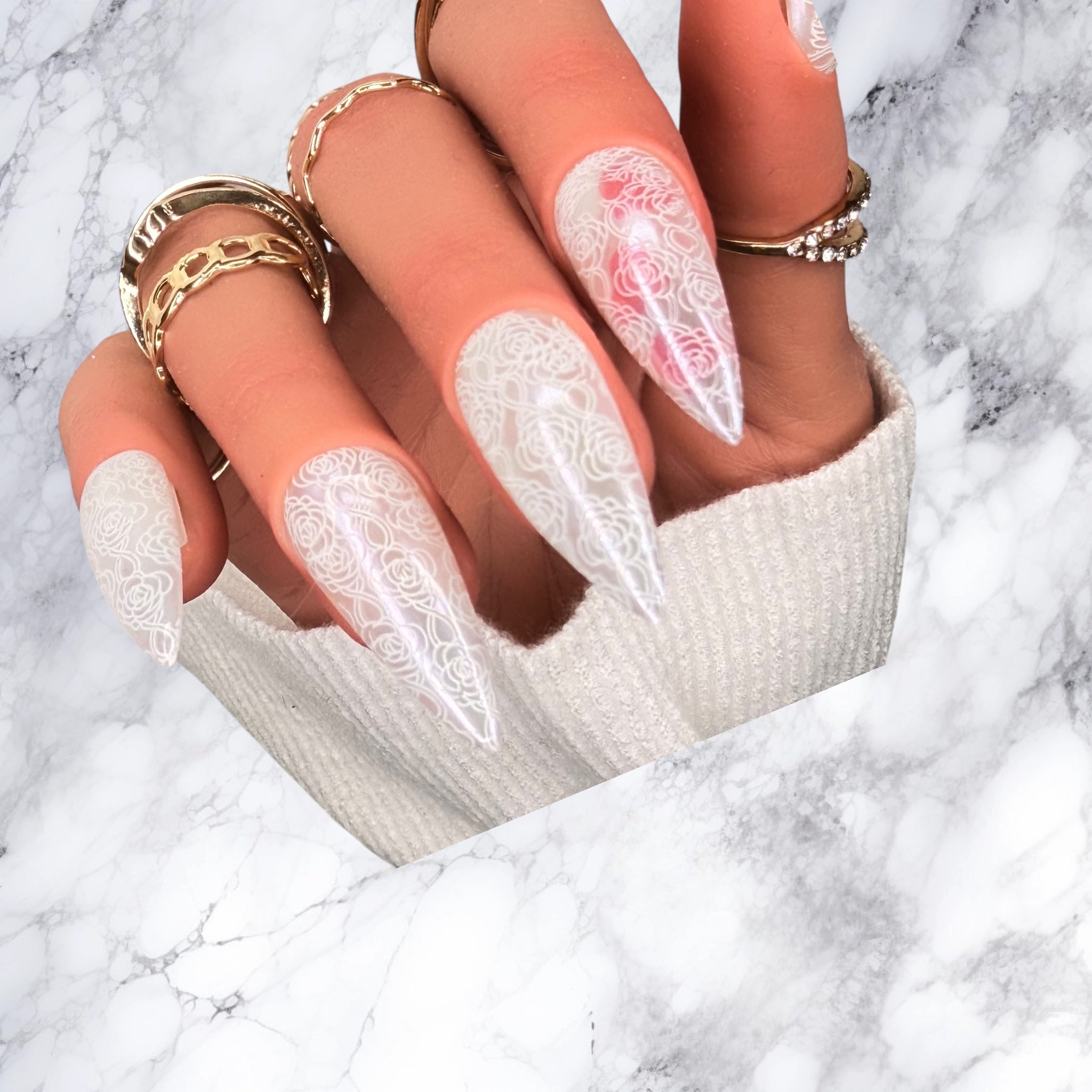 Luxury sheer ivory lace press-on nails with a soft translucent finish