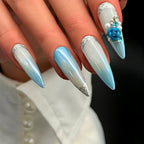 Press to Impress Aruba luxury press-on nails with blue ombre, pearlescent white, 3D floral accents, and silver glitter.