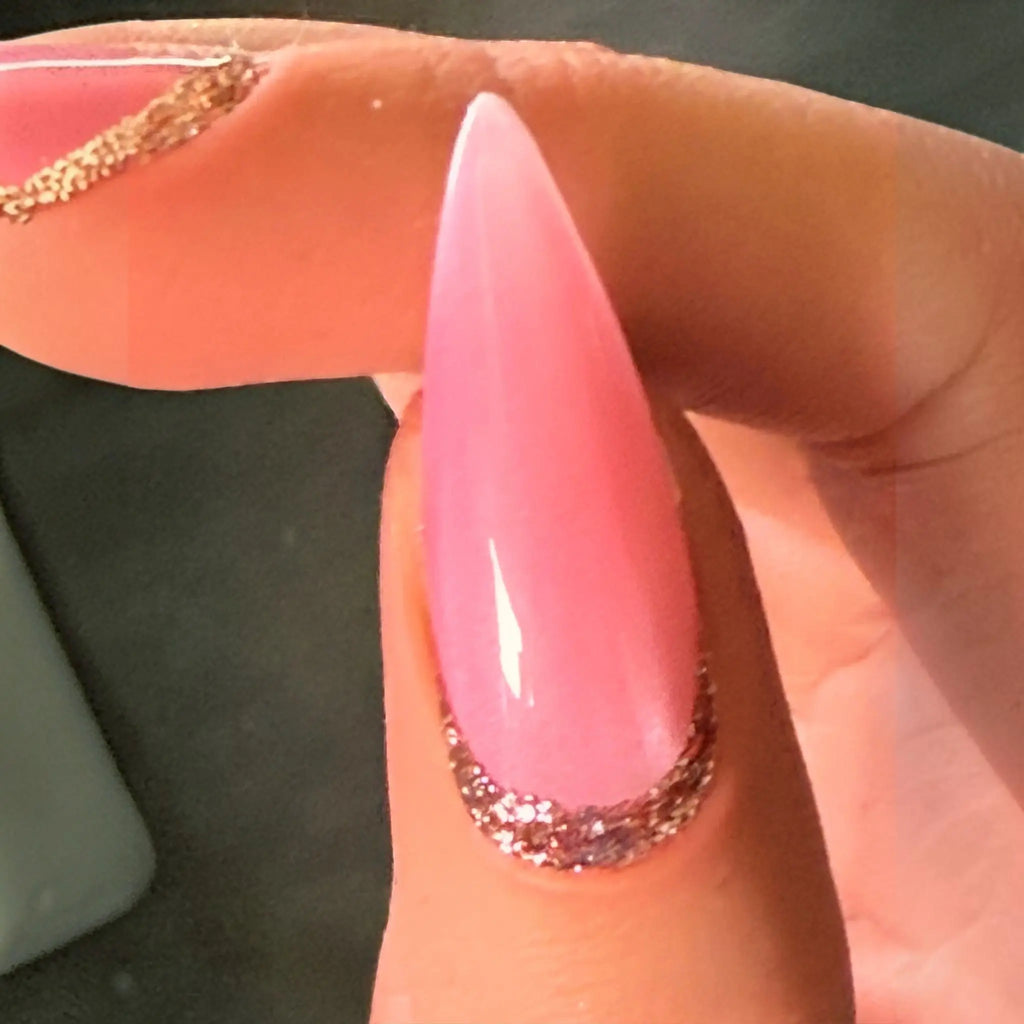 Press to Impress Barbados stiletto press-on nail with pearlescent pink shimmer and silver glitter cuticle accent