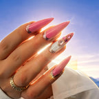 Press to Impress Barbados stiletto press-on nails with pearlescent pink, silver glitter, and crystal embellishments.