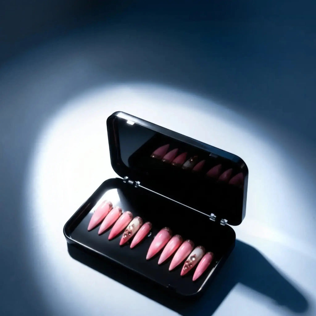 Press to Impress Barbados pearlescent pink press-on nails with silver glitter and crystal accents in a black case.