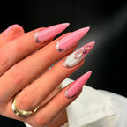 Press to Impress Barbados stiletto press-on nails with pearlescent pink, silver glitter, and crystal embellishments.