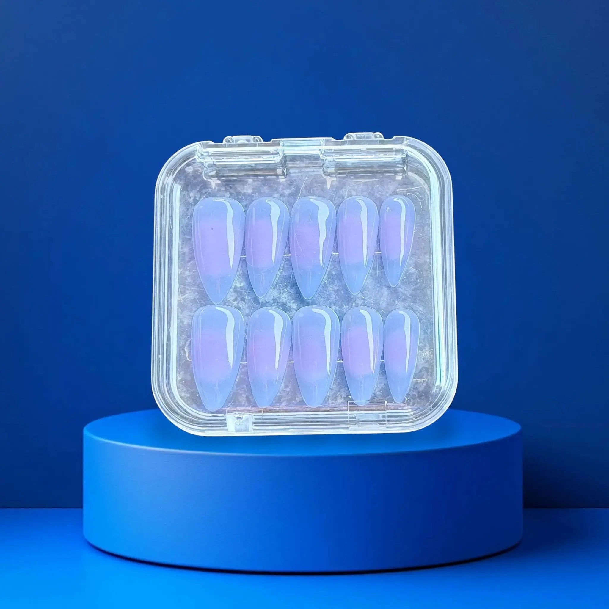 Press to Impress Blue Haze soft sky blue jelly press-on nails with translucent glossy finish and airy cloud-like tone.