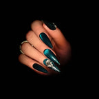 Press to Impress Emerald Eclipse stiletto press-on nails with velvety chrome glow and crystal accent.