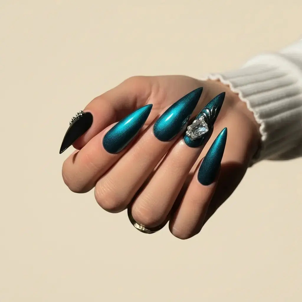 Press to Impress Emerald Eclipse stiletto press-on nails with metallic green finish and crystal accent.