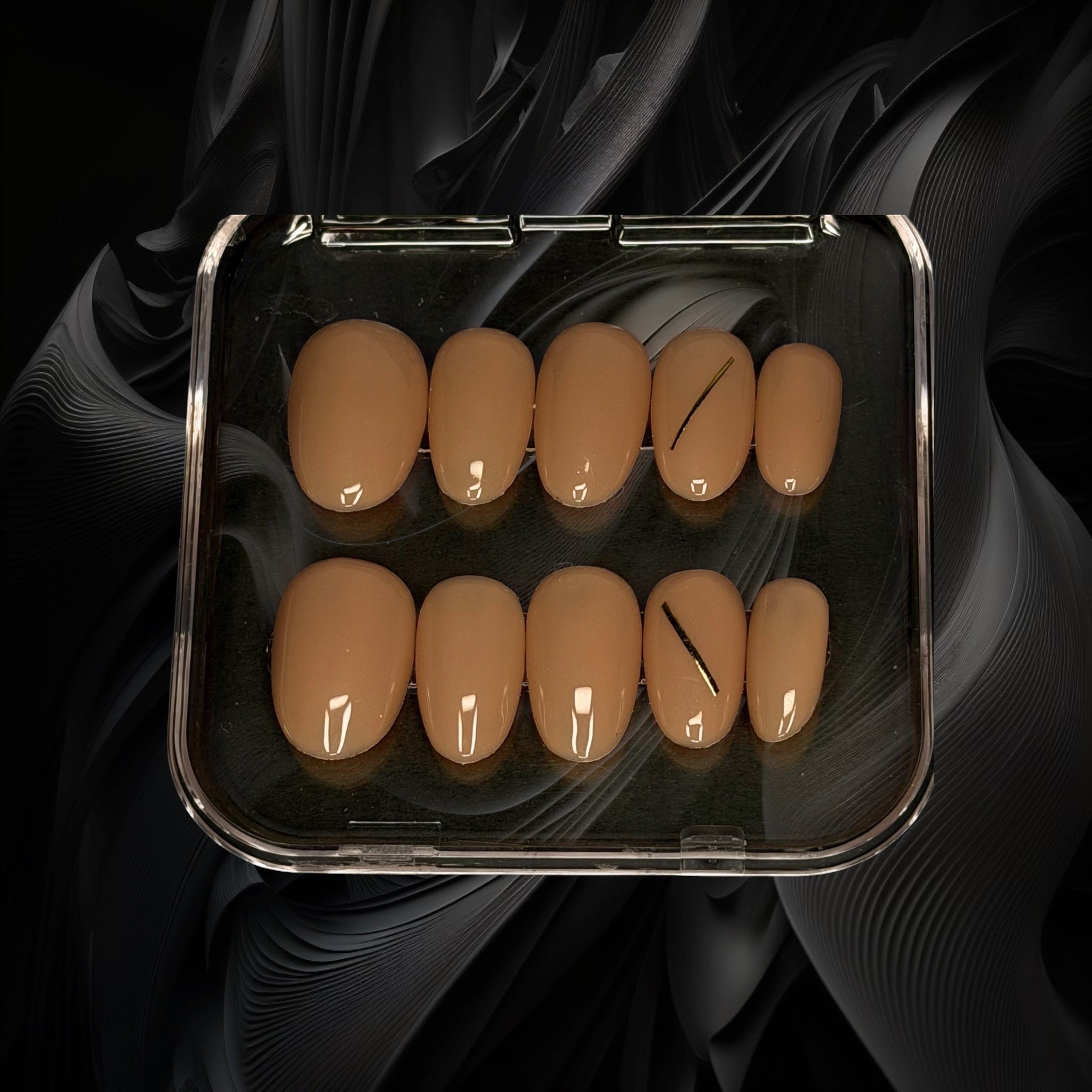 Press to Impress Golden Hour Beige short round press-on nails with a gold line accent. Luxury nude.
