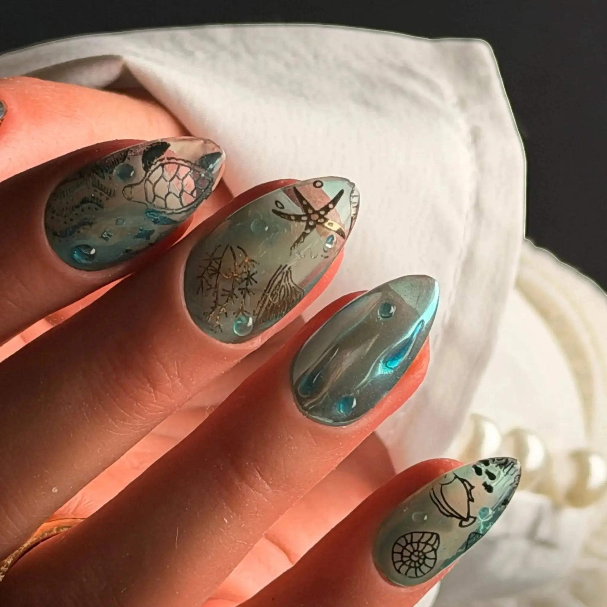 Press to Impress Lost Atlantis luxury press-on nails with seafoam chrome, golden ocean art, and crystal water droplets.
