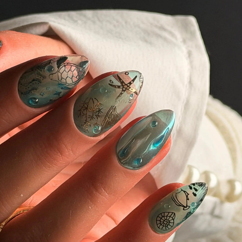 Press to Impress Lost Atlantis luxury press-on nails with seafoam chrome, turtle, starfish, and shell art.