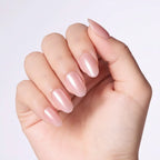 Press to Impress Luminous Silk Glaze short round pearl chrome press on nails in soft pink nude.