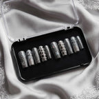 Press to Impress Midnight Stardust long square press-on nails with black micro-glitter and silver star accents.