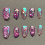 Press to Impress Orchid Mirage iridescent chrome press-on nails with sculpted florals and crystal embellishments in violet hues.