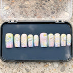 Press to Impress Pastel Mermaid Pearl Press-On Nails with iridescent chrome finish, pastel hues, pearls, and gold shell accents.