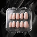 Press to Impress Refined French reusable press-on nails in soft pink nude with white French tips, short round shape.