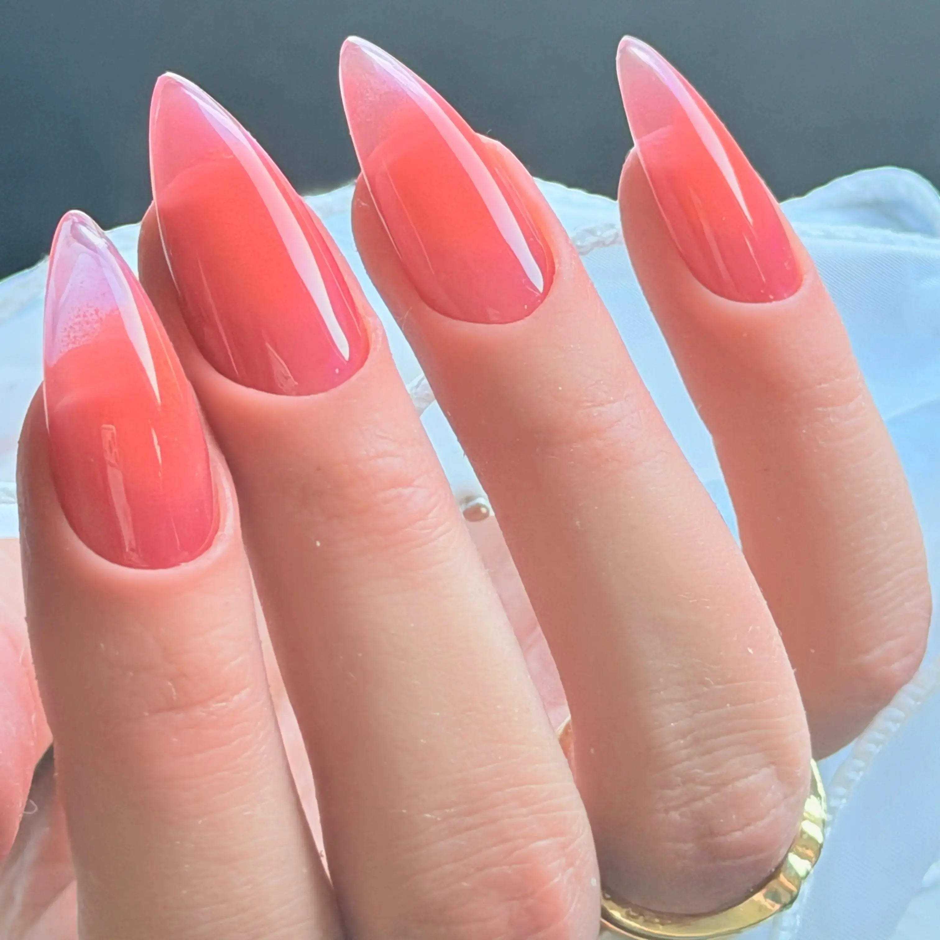 Press to Impress Sunset Syrup jelly nails with a juicy coral-pink hue, soft syrup gradients, and ultra glossy shine.