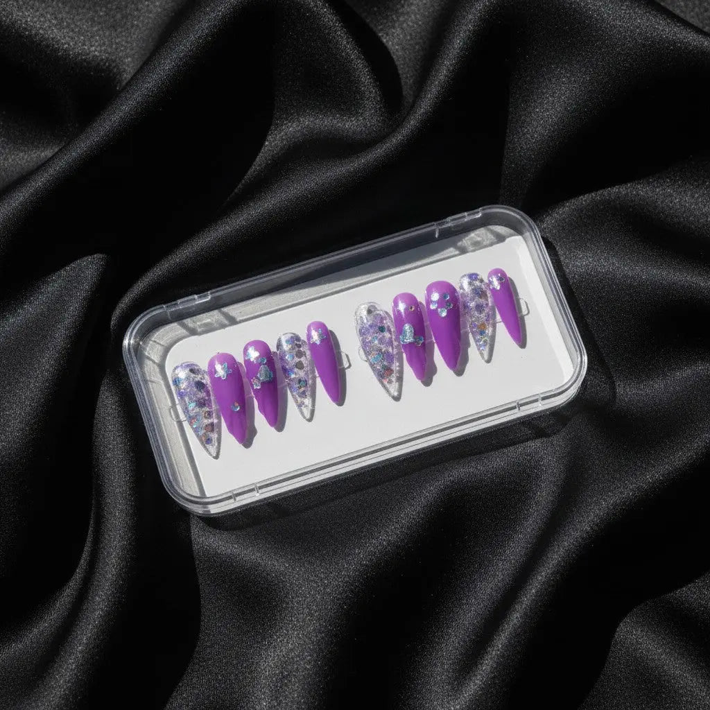 Press to Impress Violet Mirage stiletto press on nails with holographic glitter and butterfly accents.