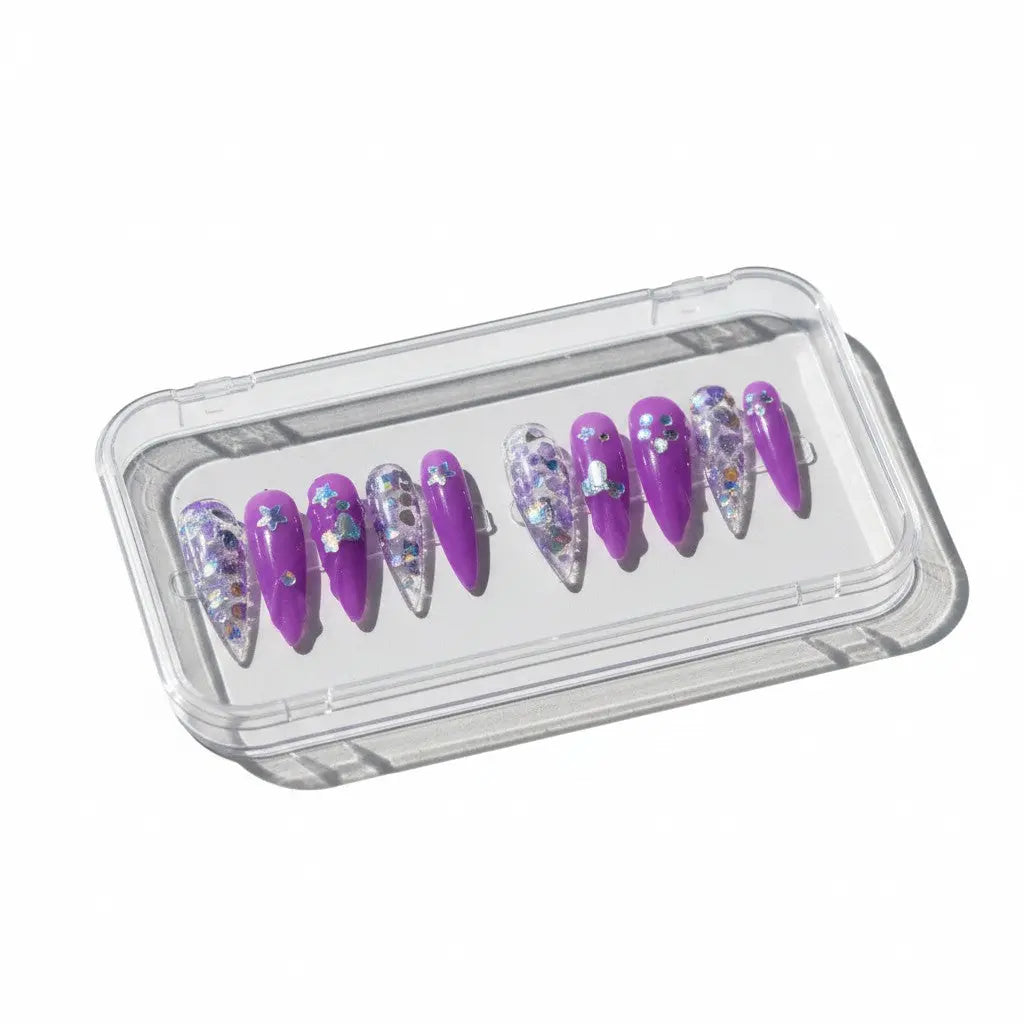 Press to Impress Violet Mirage stiletto press on nails with holographic glitter and butterfly charms.