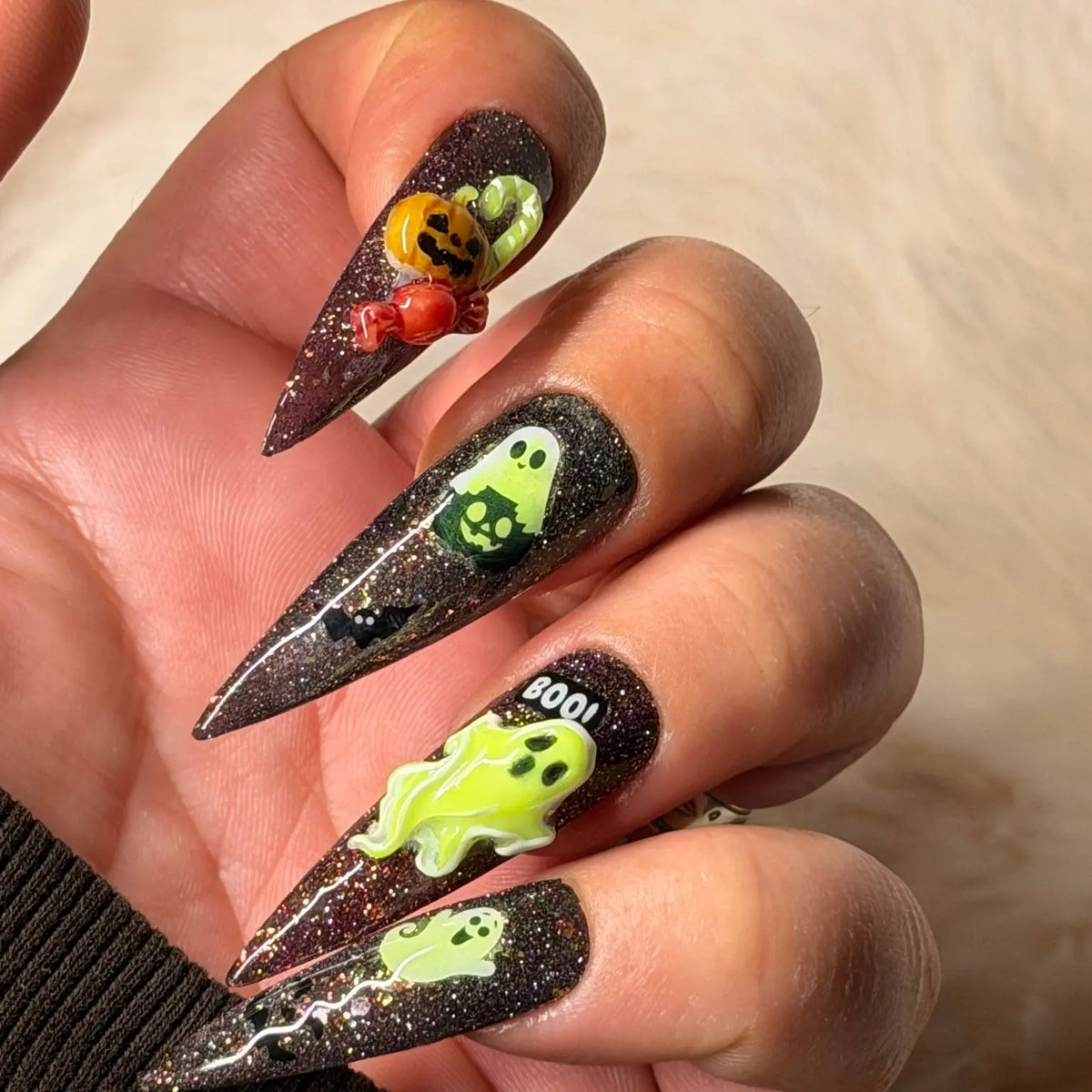Spellbound Spirits handmade Halloween press-on nails with glitter gel and sculpted ghost, pumpkin and spooky nail art – view 1